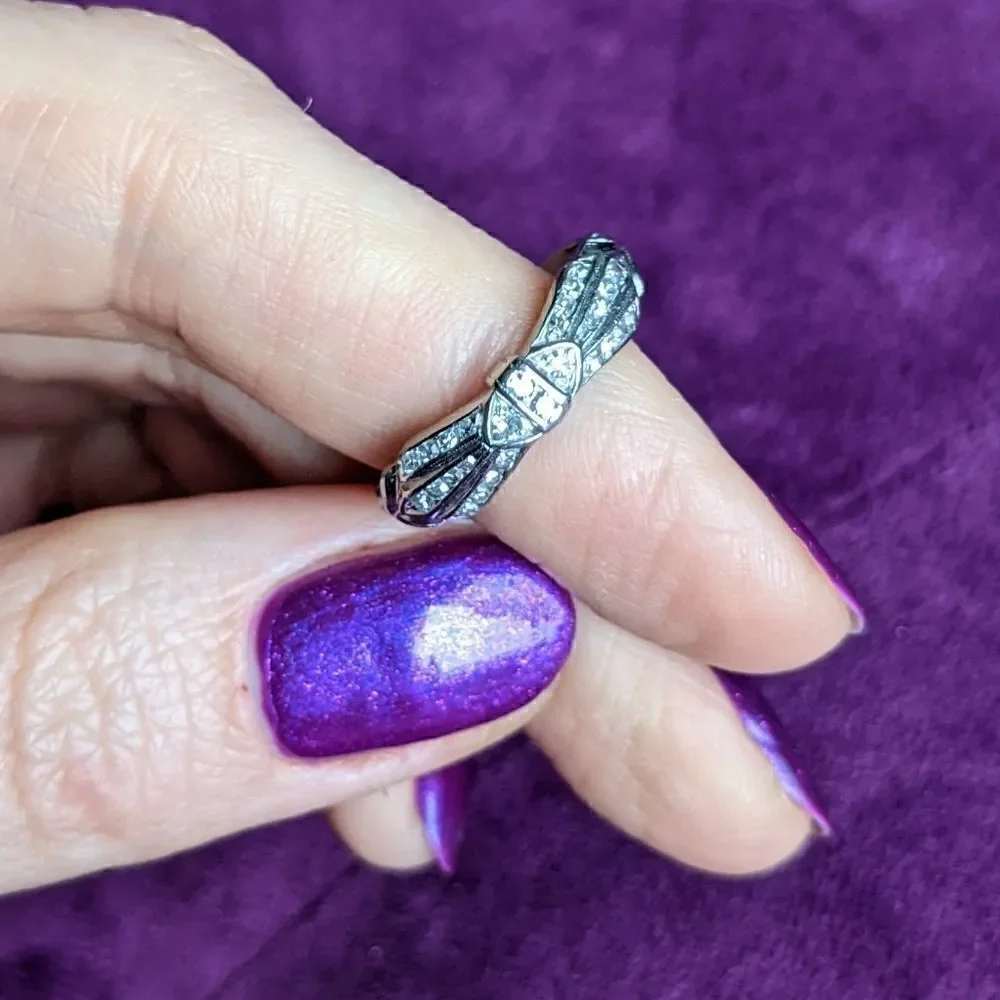 READ CAREFULLY bow shaped platinum ring